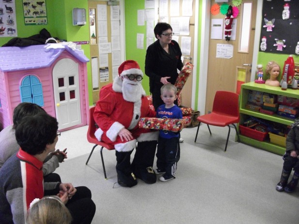 Santa Claus Visits The Wee Tots Creche on Basin Street in Dublin 8