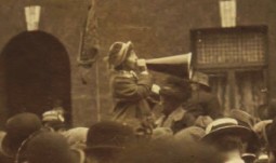 An unidentified woman addresses a crowd of strikers during the 1913 Lockout